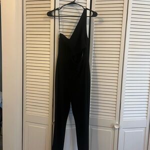 Jumpsuit never worn 
Cutout in the middle